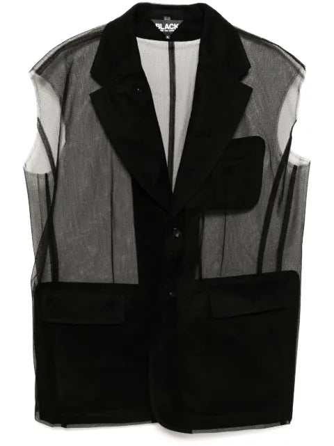 Black Comme Des Garçons sleeveless blazer