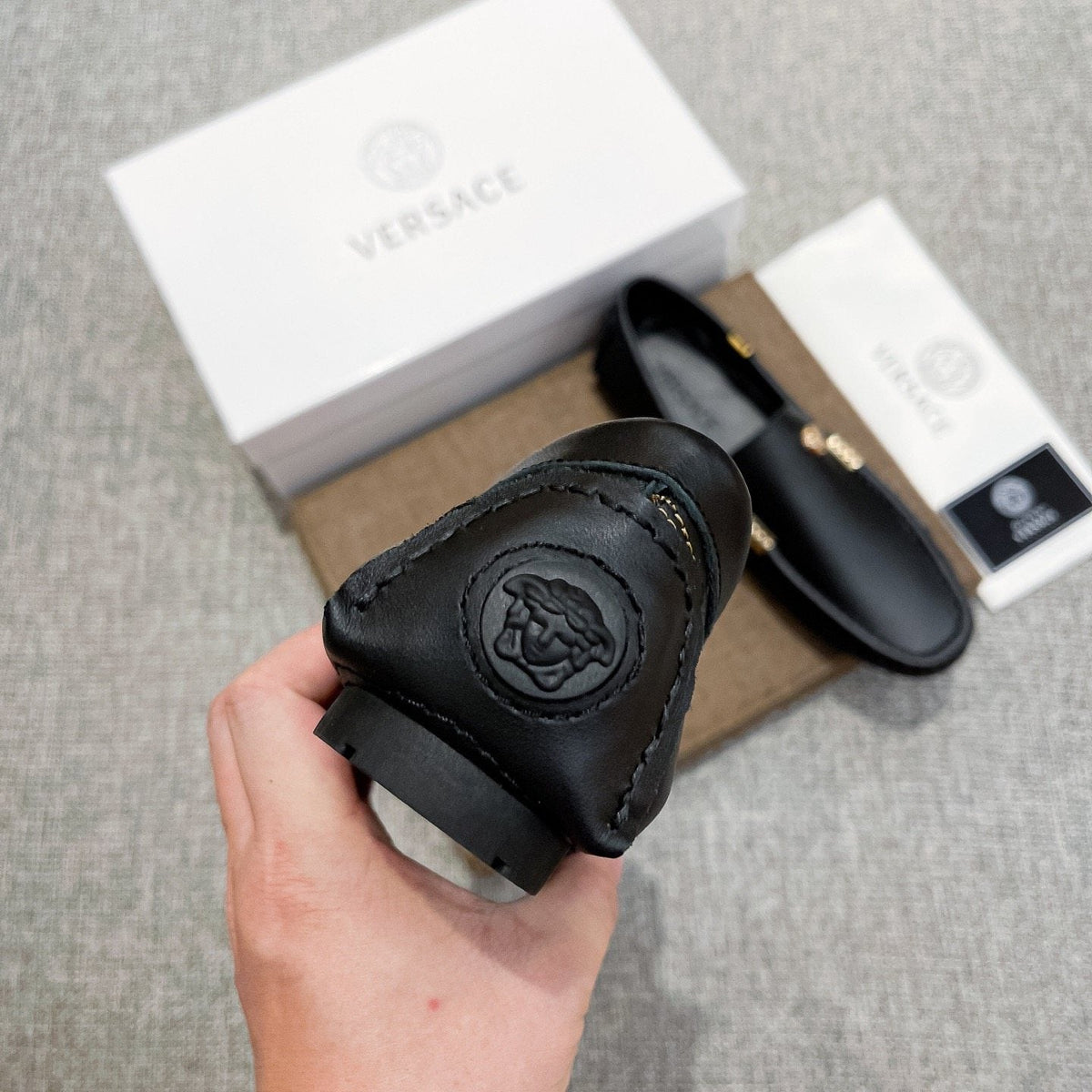 Versace Black Leather Loafers with Gold-Tone Accents
